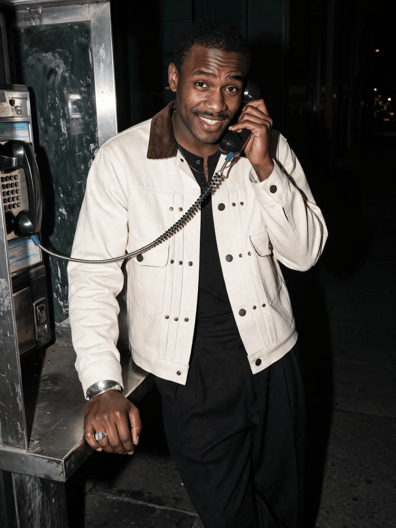 Stylish Man at Nighttime Payphone example 23