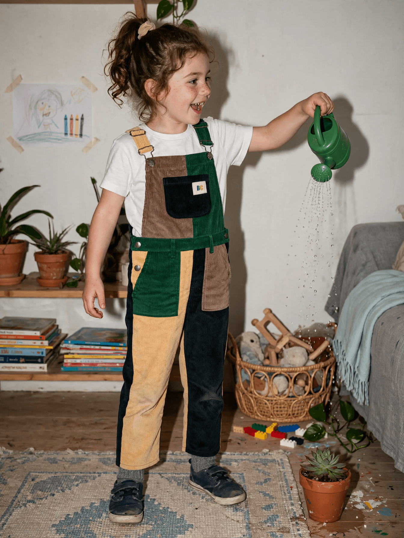 Child Watering Plants in Overalls example 29