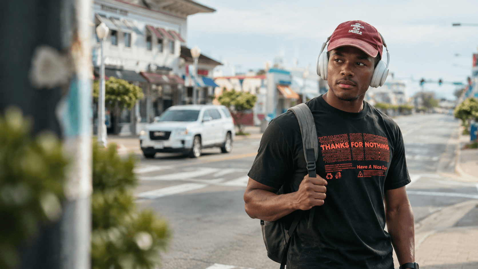 Young Man Walking on City Street example 5