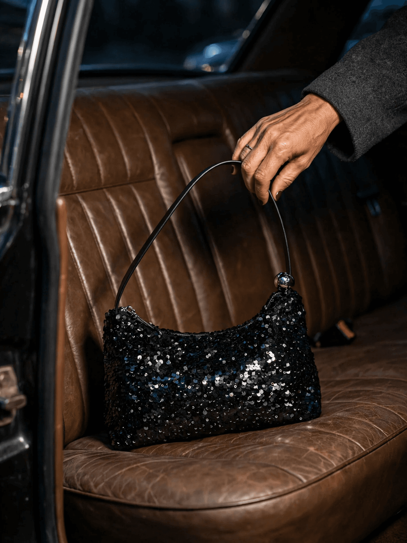Sequined Handbag on Leather Car Seat example 11