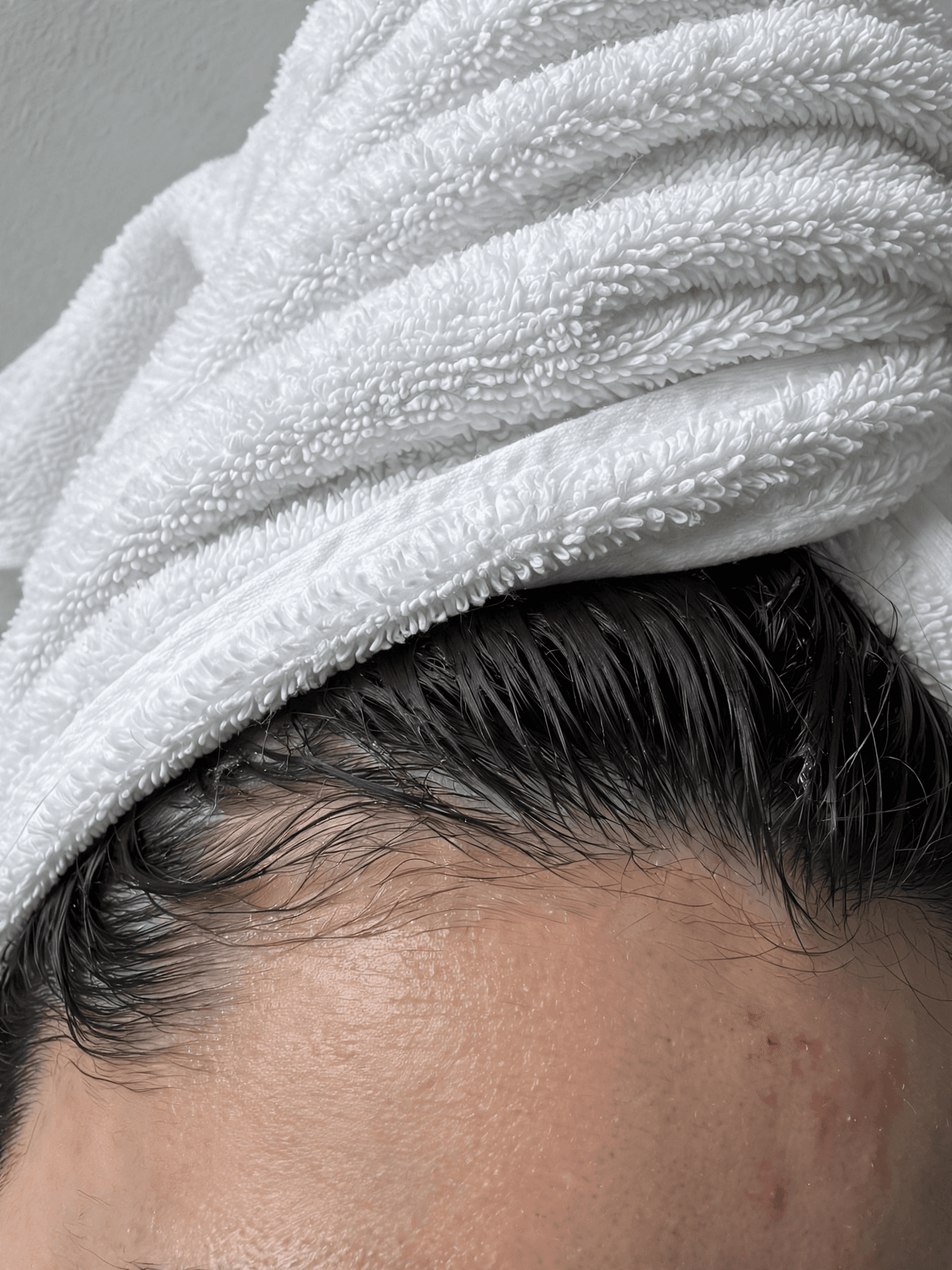 Damp Hairline Wrapped in White Towel example 15