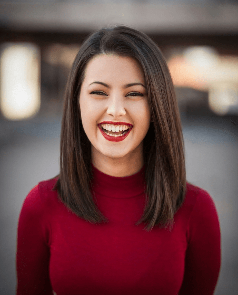 Smiling Woman in Red Mock Neck example 33, output 2