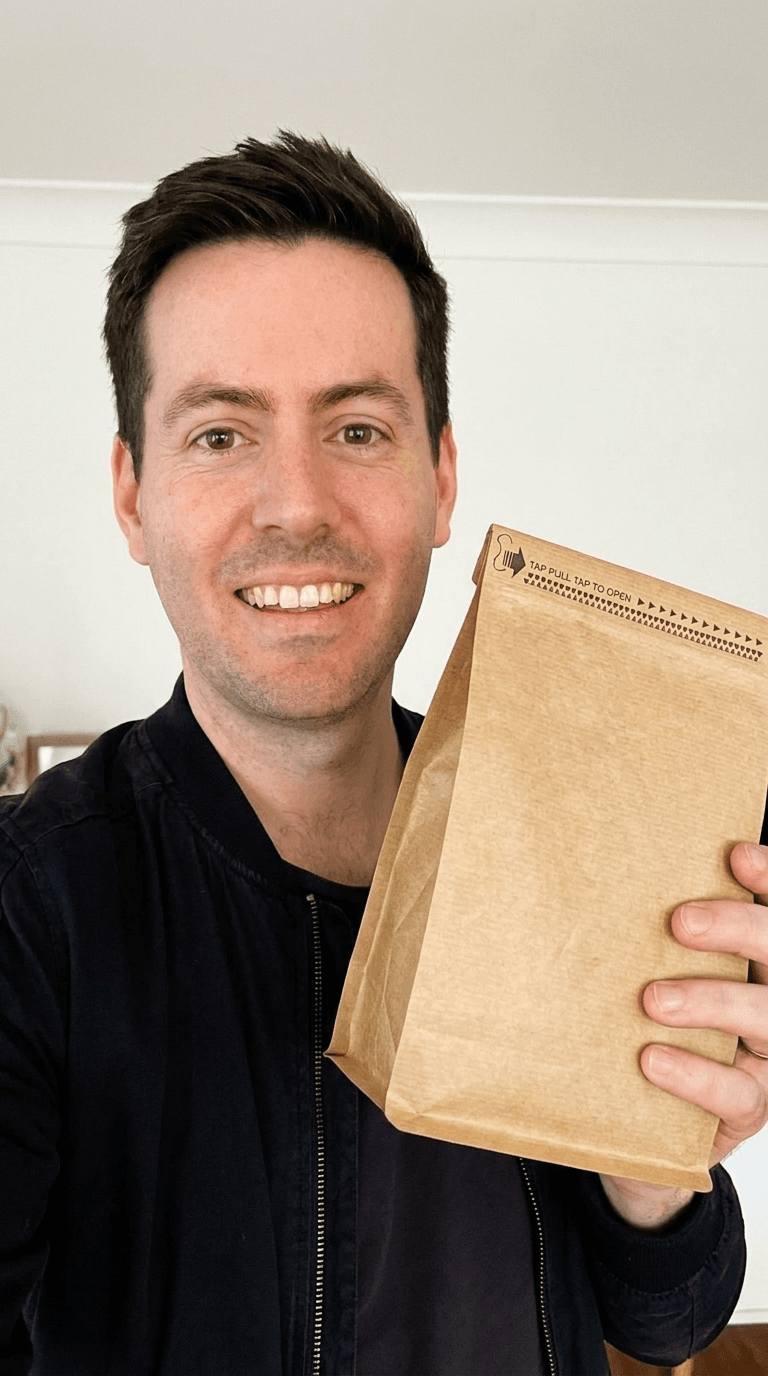 Man Holding Kraft Paper Bag example 37